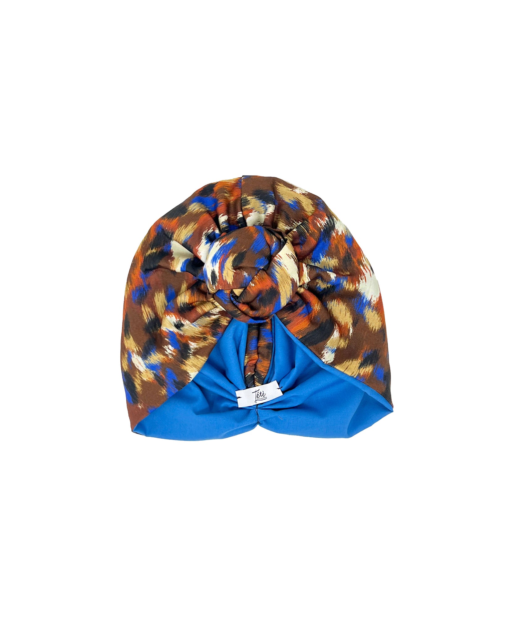 Spotted patterned cotton satin turban in shades of camel electric blue orange