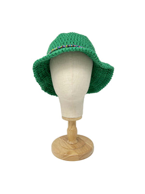 Green handmade crocheted bucket hat with pom poms