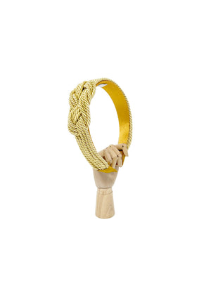 Gold three-strand hairband with side braided knot