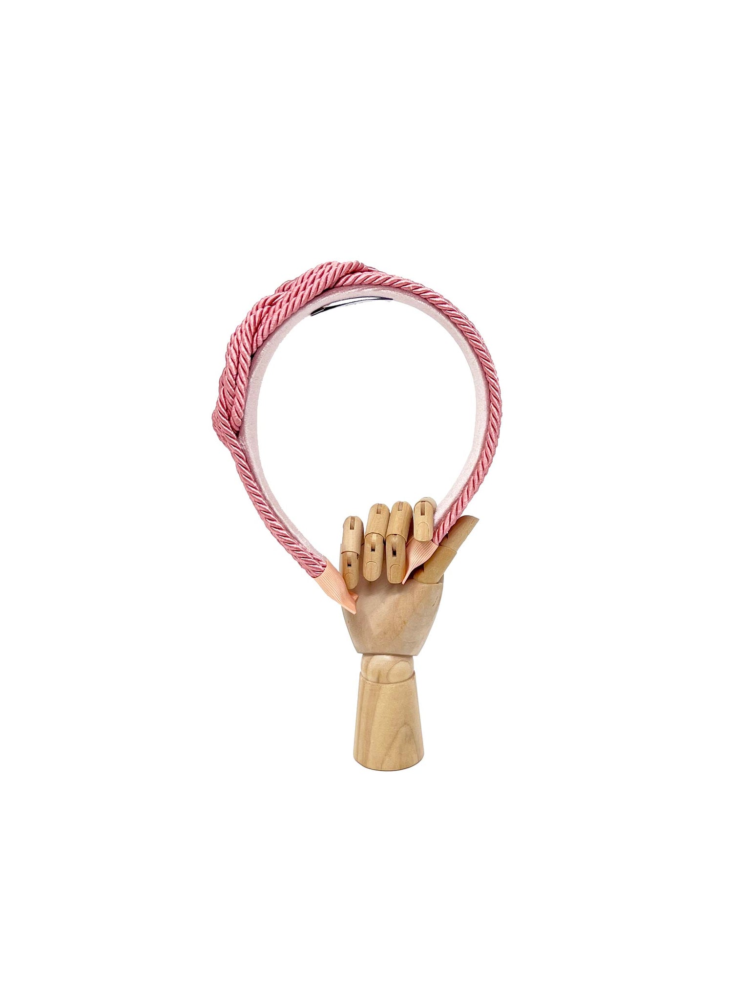 Pink three-strand hairband with side braided knot