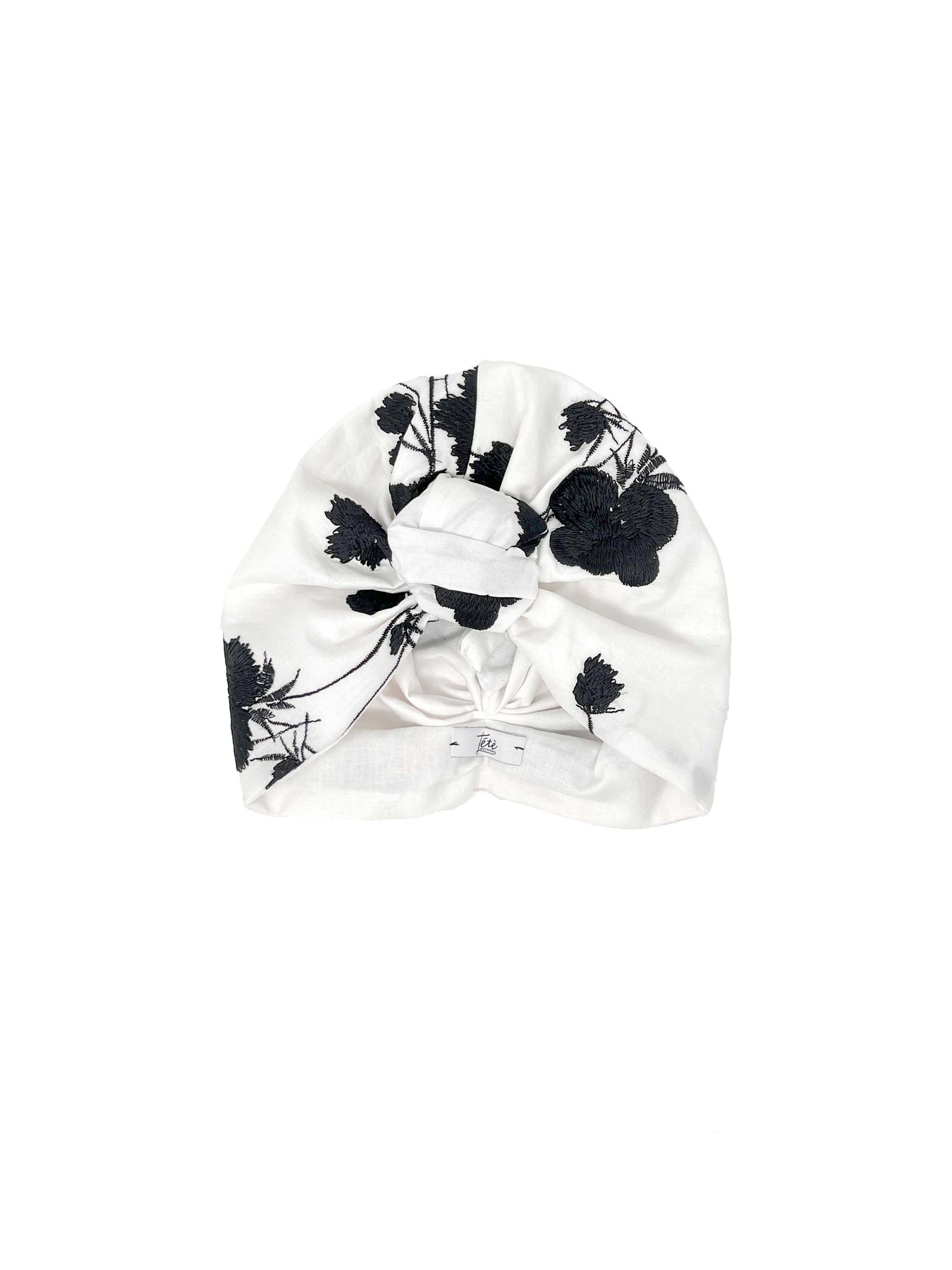 Turbante in cotone bianco con fiori neri ricamati in cotone